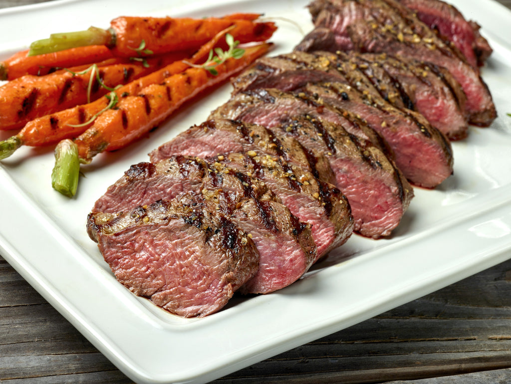 Ostrich Steak Tenderloin that's grilled and seasoned and cut into slices