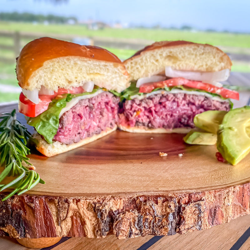 close up of ground ostrich meat prepared in a grilled burger